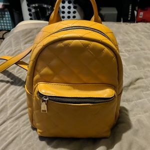 Mini yellow backpack purse